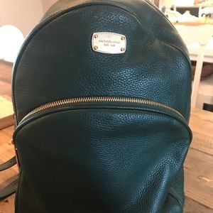 Micheal Kors green leather backpack